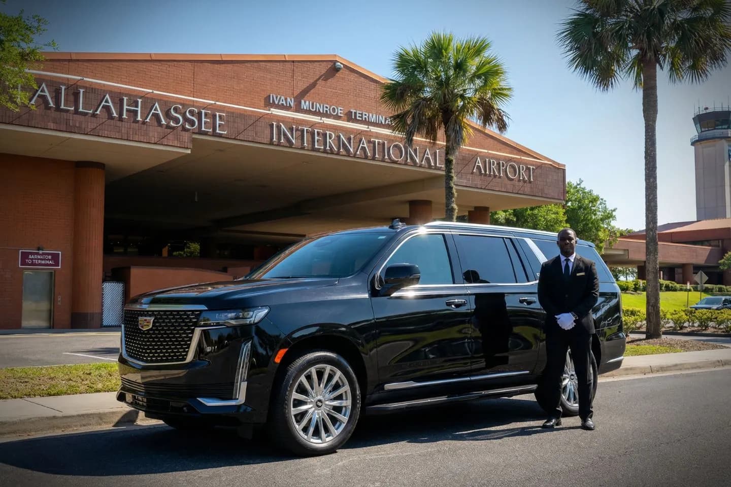 Tallahassee International (TLH) Car Service luxury sedan at airport terminal Florida FL