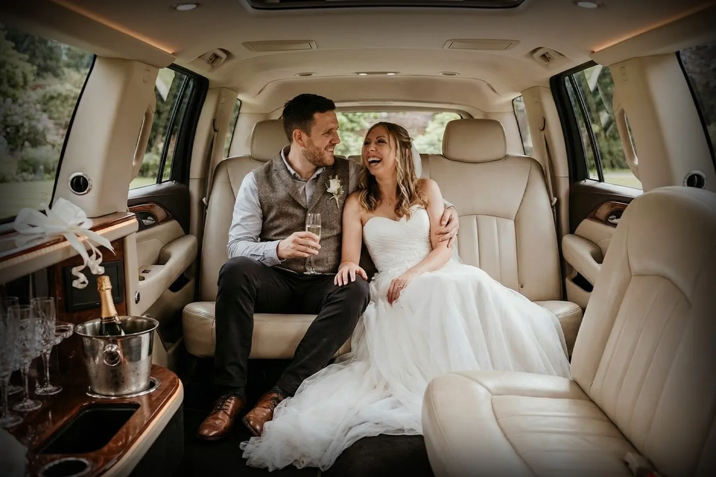 wedding limo service Luxury wedding limousine with professional chauffeur ready for bride and groom