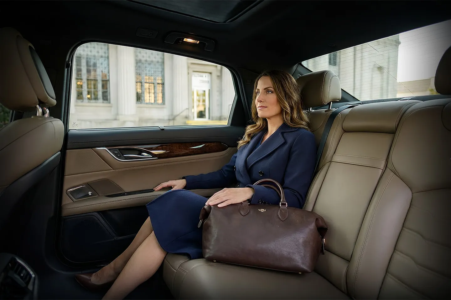 Chauffeur Service in Fulton, NY Professional chauffeur assisting passenger into premium vehicle in Fulton NY chauffeur service setting